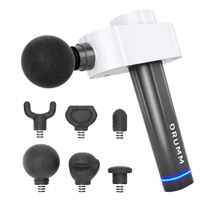 Massage gun with black ball attachment and six interchangeable heads on a white background